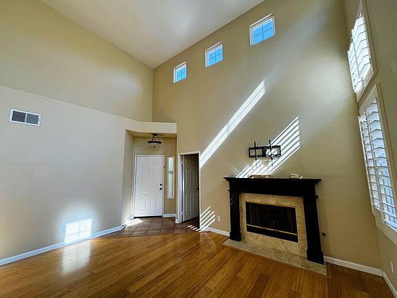 Great Room, upgraded fireplace, and provided TV mount