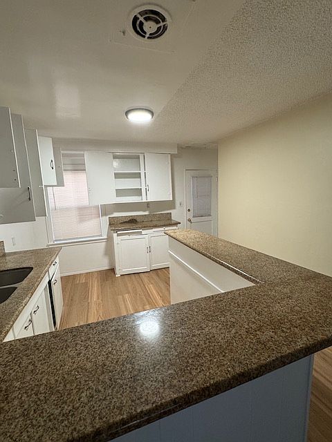 Bright, lots of cabinet space, double sink, marble countertops