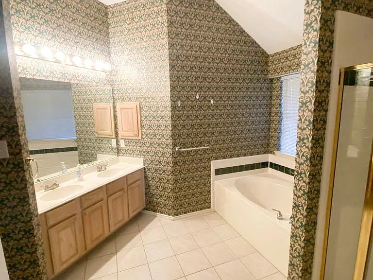 Separate His & Her vanity sinks.