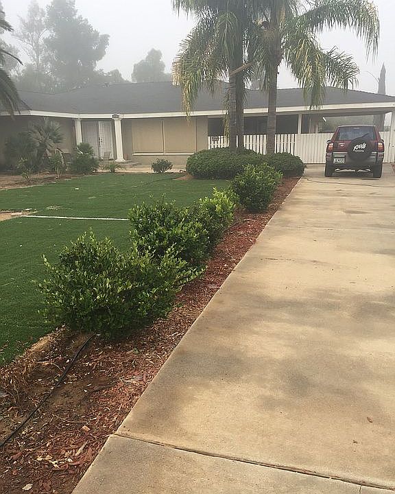 2-1/2 GARAGE & WIDE Carport!