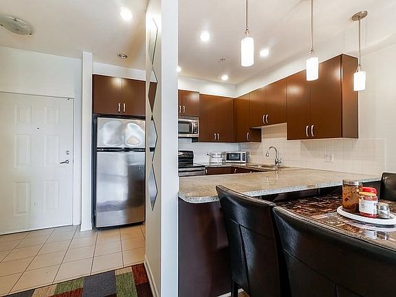 5th image of 10237 133rd St Unit 212