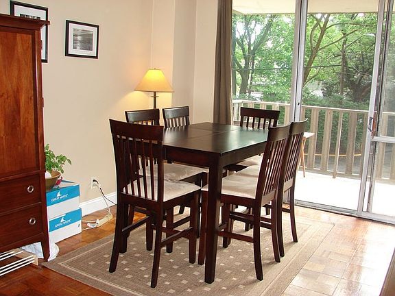 Dining area w/ sliders to balcony