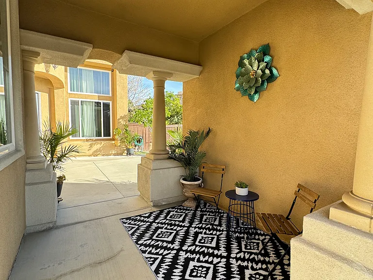 Courtyard entrance to casita with private entry with seating area ideal for enjoying morning coffee and fresh air.