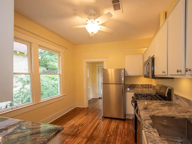 Brazilian granite countertops. Stainless steel appliances.
