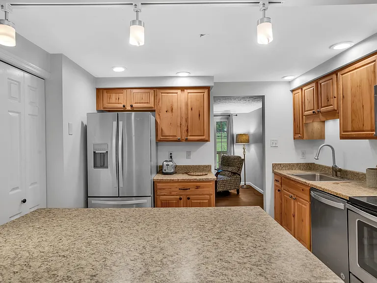 Kitchen with Large Island and Oversized Pantry.