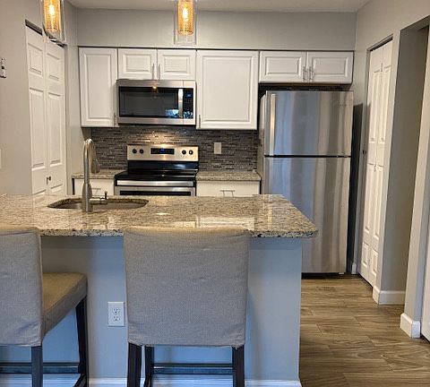 3rd image of 7596 Lakeside Village Dr Unit H