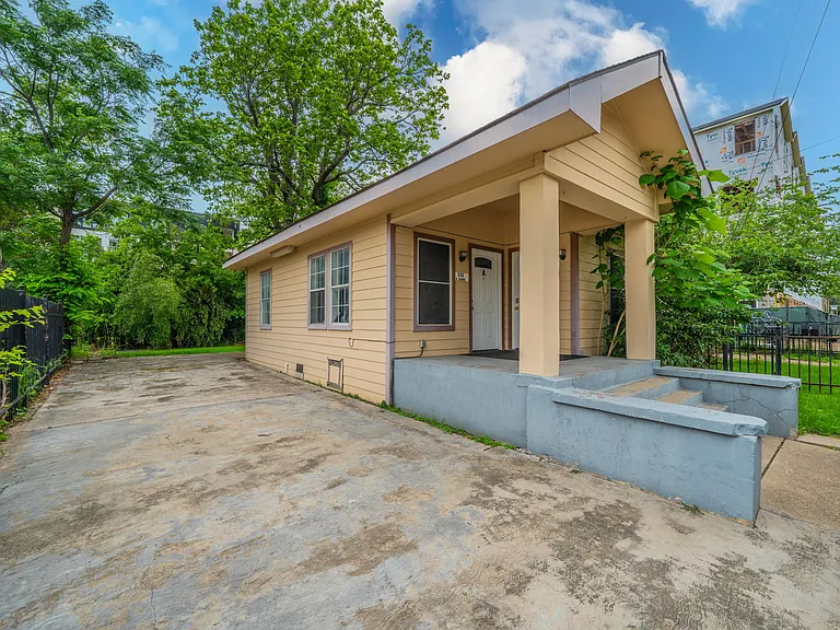 Enjoy the convenience of a spacious driveway and gated entry.