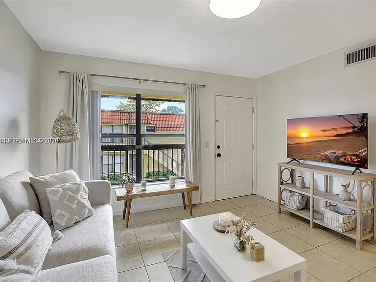 561 NW 100th Pl #201 — Photo 1