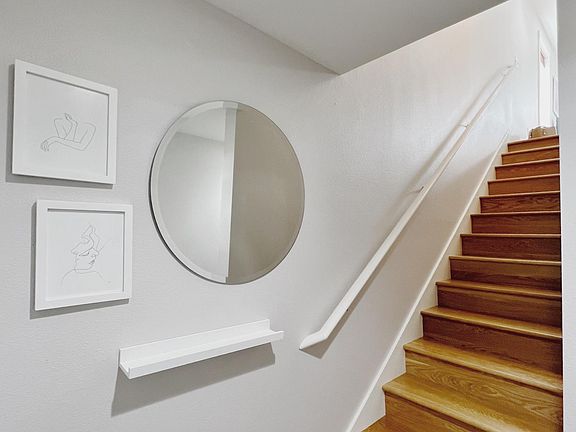 Entrance foyer with hardwood stairs