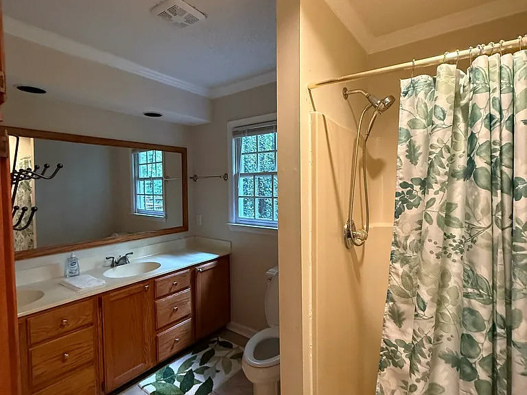 Primary suite has access to a double vanity sink