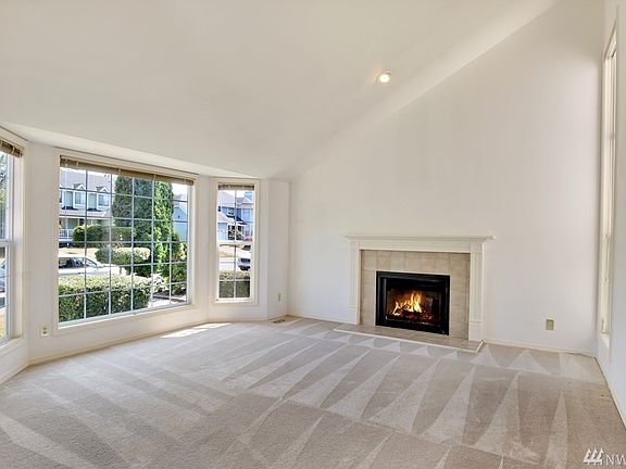 Vaulted Ceilings and Bay windows, Fireplace in the Formal Living Room off Entrance