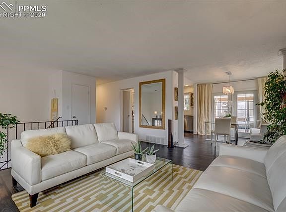 Adjoining to the dining area and kitchen.  French doors lead to the wonderful backyard Oasis.