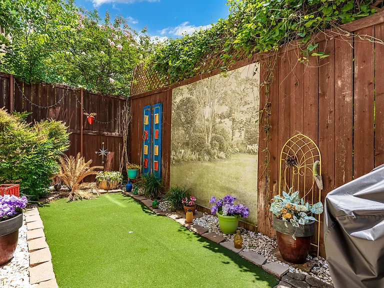 Backyard with access off of 1st floor bedroom and garage
