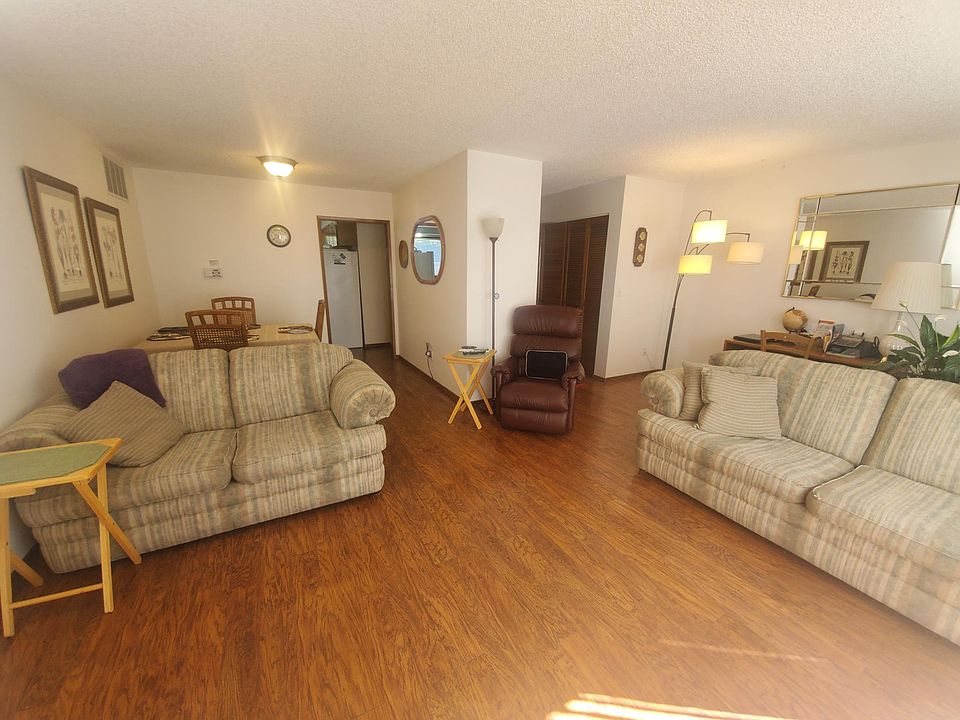 Open floor plan living and dining room off kitchen