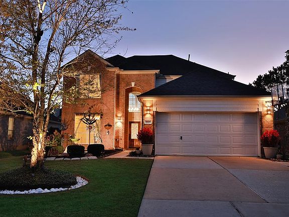 Exterior lighting adds that extra touch to the curb appeal. All lights in flower beds and trees are on a timer, so you can control when they go off and on.