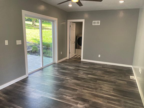 Living room with walk out to patio/outdoor sitting area