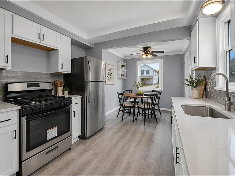 Kitchen with eat in area virtualy staged