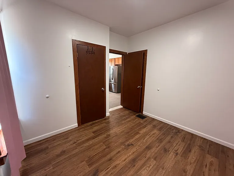 Bedroom 1 - 2 closets and 2 windows