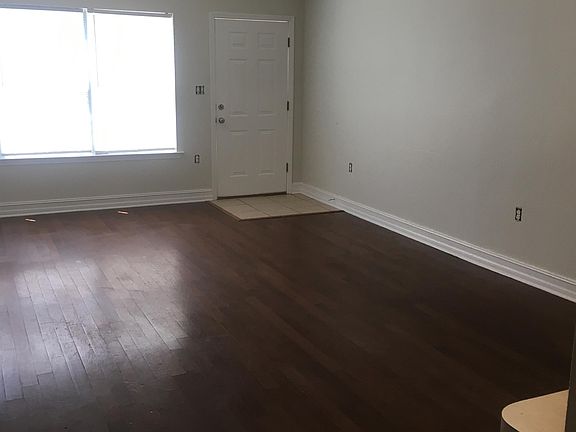 Living area with access to back deck