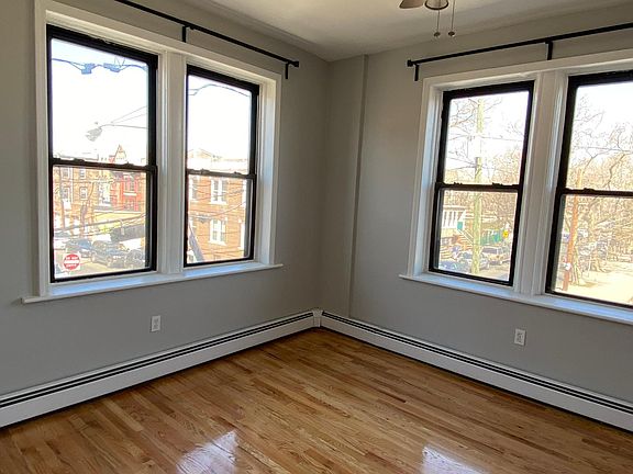 Large bedroom with amazing views of Riverview-Fisk Park and NYC skyline.