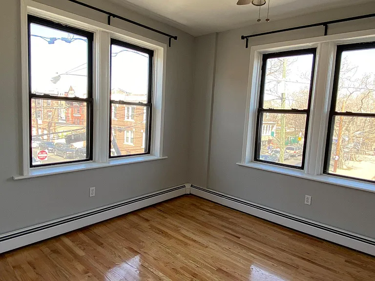 Large bedroom with amazing views of Riverview-Fisk Park and NYC skyline.