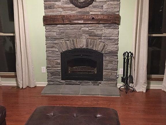 Fireplace
						:
						High efficiency wood burning insert with stone work and reclaimed mantle.