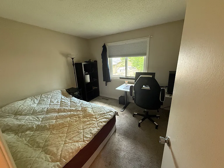 RIGHT upstairs bedroom (current tenant setup queen bed & desk)