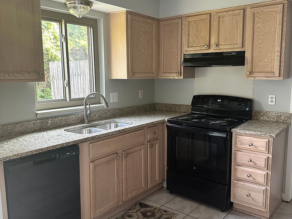 New stove, sink, countertops and windows