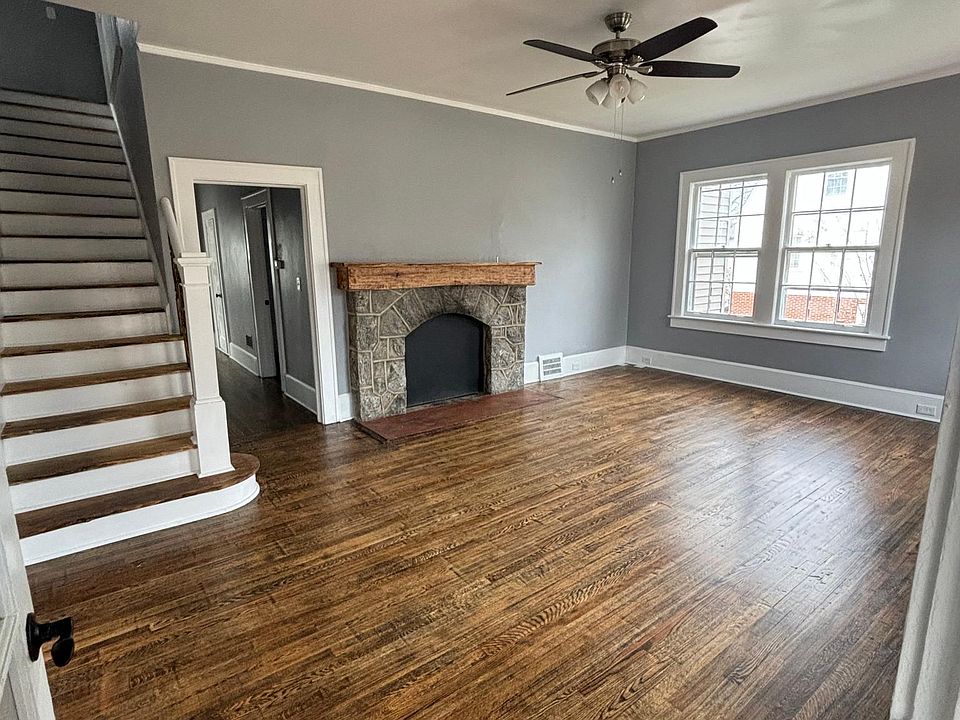 Living room of 116 Conestee Ave from foyer after walking through the front door
