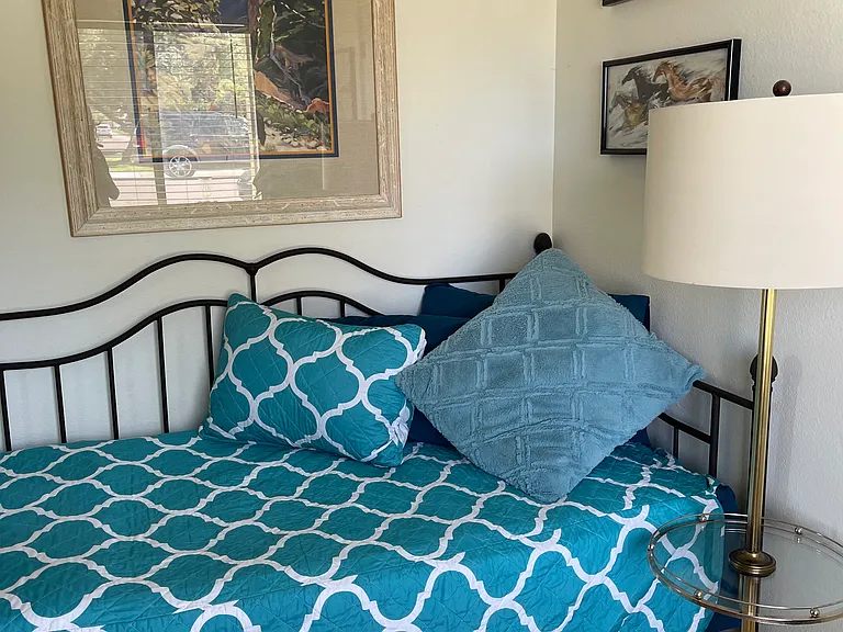 Twin bed in second bedroom along with a trundle bed underneath.