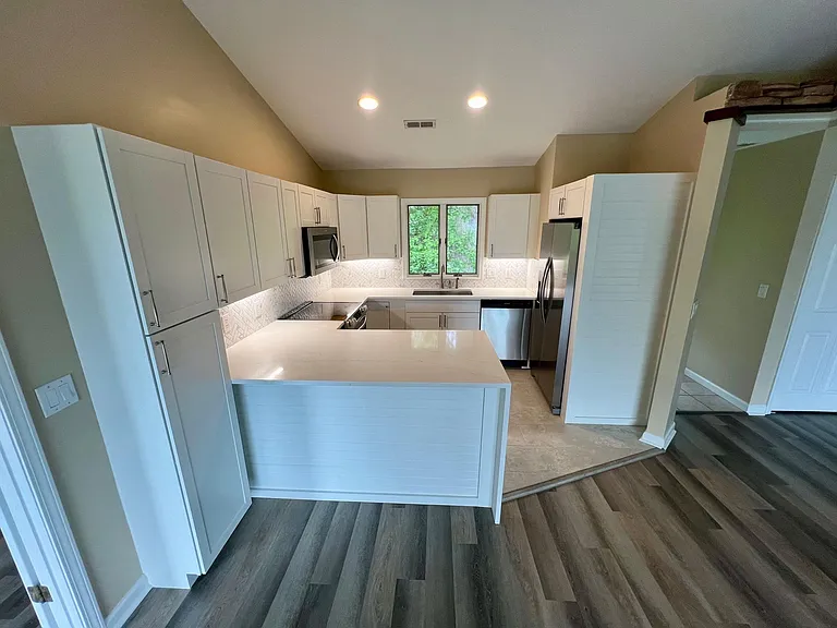 Large counter space and extra storage are some of the highlights of this well appointed kitchen