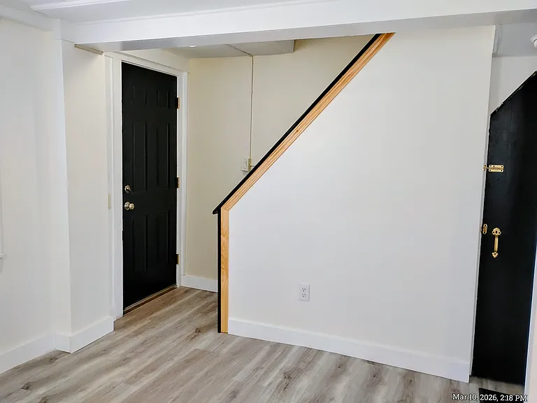 Living room has a bonus exit front door - super safe! 
Freshly painted Doors in Midnight Black!