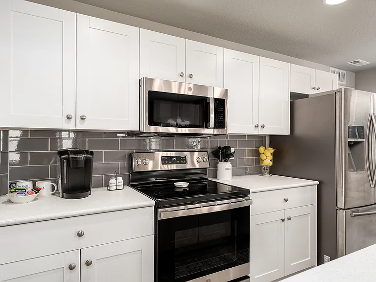 Fully equipped kitchen with Keurig, dishes, cookware, air fryer, blender, etc.