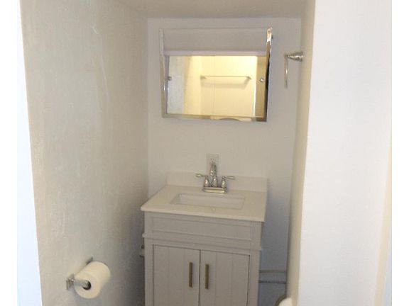New vanity and lighted medicine cabinet.