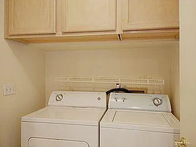 Laundry room linked the 2 car garage and kitchen
