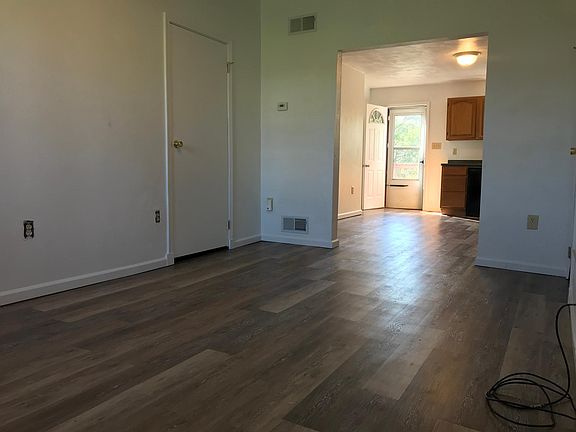 Living room with coat closet