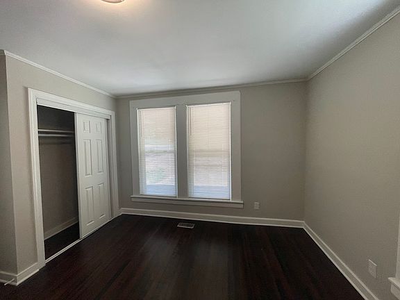 This is the bedroom near the laundry room.