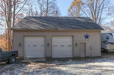 40X30 Detached Garage/Workshop. Concrete Floor has Electric, Gas and Plumbed for Full Bath. Has a Separate Meter.