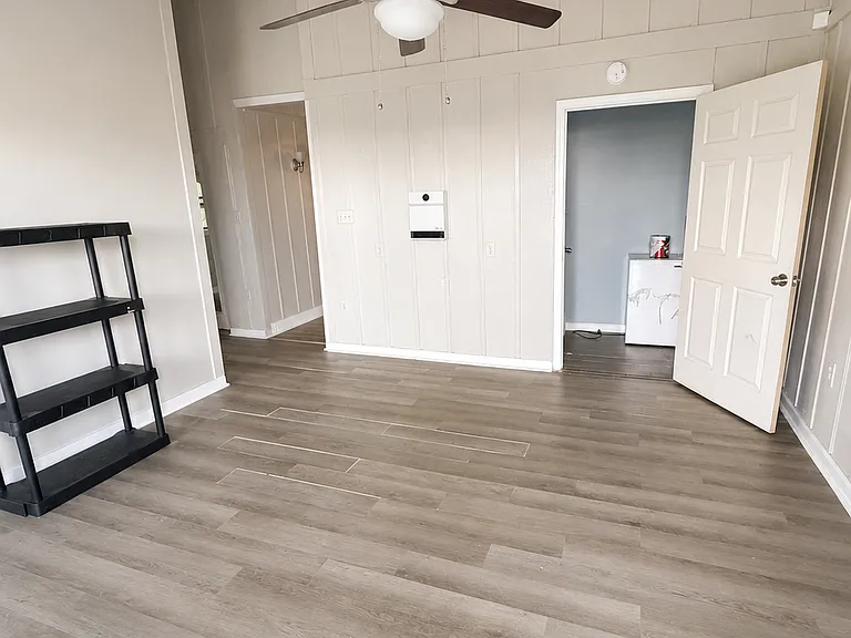Living room with extra storage closet
