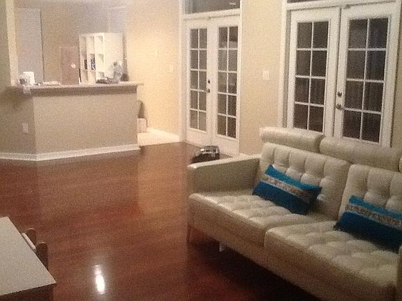 Laminate wood floors, combination living room and dining roo