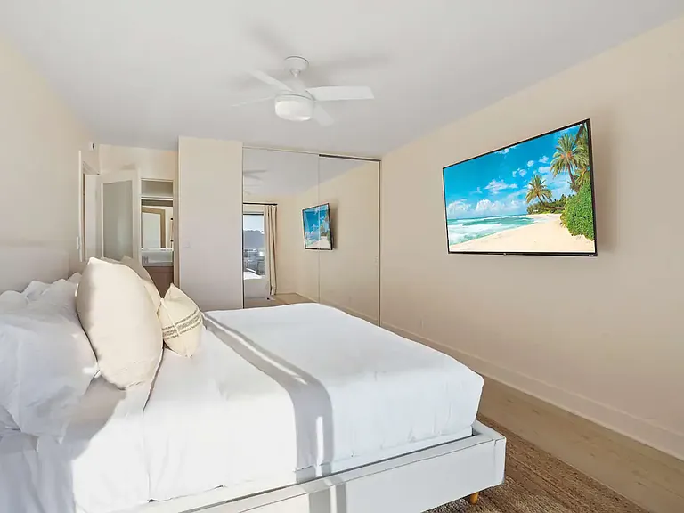 A serene escape featuring a king-sized bed and minimalist decor for ultimate comfort.