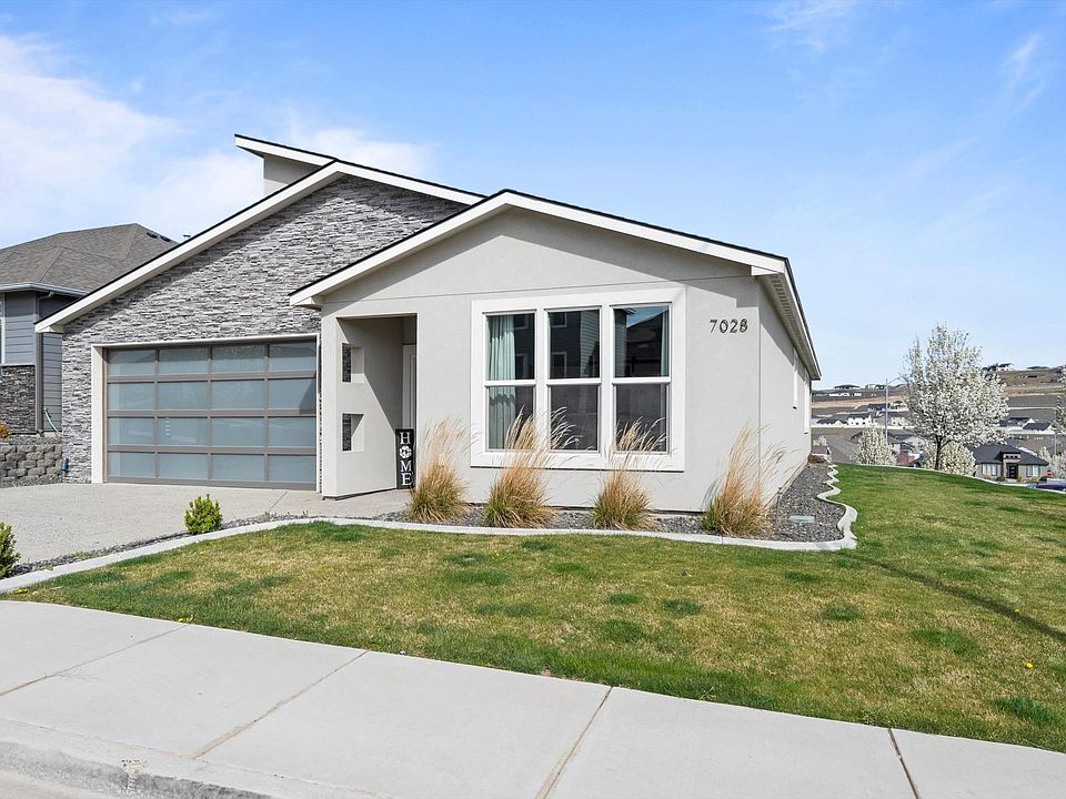 1st image of 7028 W 32nd Ave