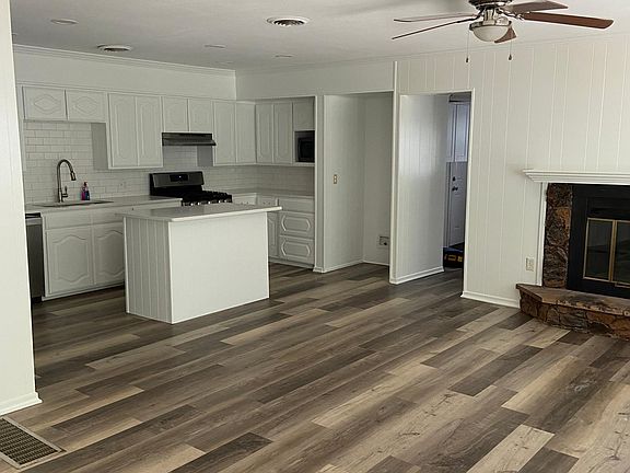 KITCHEN DEN AREA WITH GAS FIREPLACE