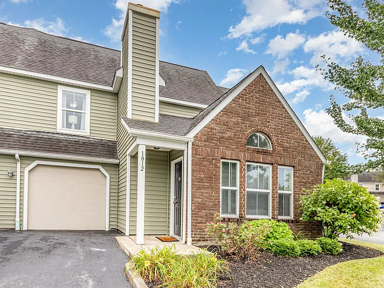 Welcome to a home with timeless charm, featuring thoughtful architectural details and a warm, inviting curb appeal.