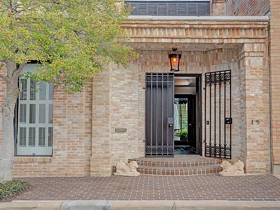 ENTRY: Close up shot of the double door entry looking through foyer to atriums.
