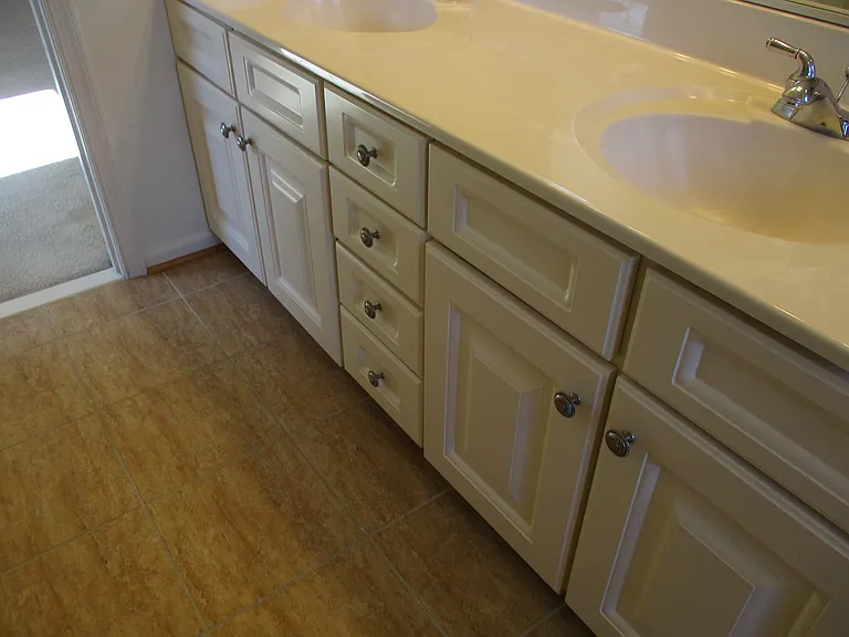 Double Sinks and Lots of Vanity Storage in Owner's Bathroom