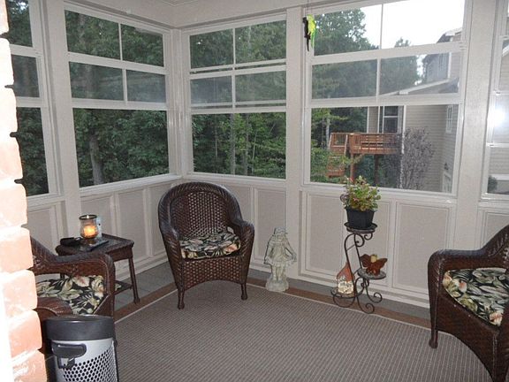 Enclosed sunroom off kitchen