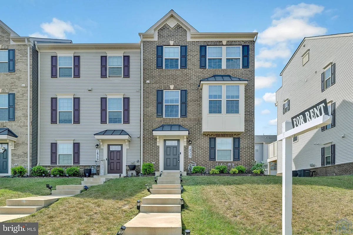 Building Photo - 14737 Earl Mitchell Ave #E