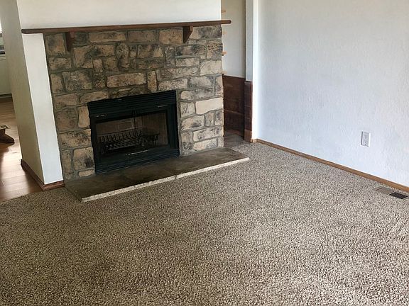 Log burning fireplace in living room