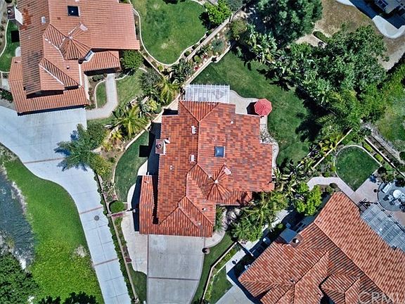 This unique shot shows off the grassy lawns that surround your new backyard!